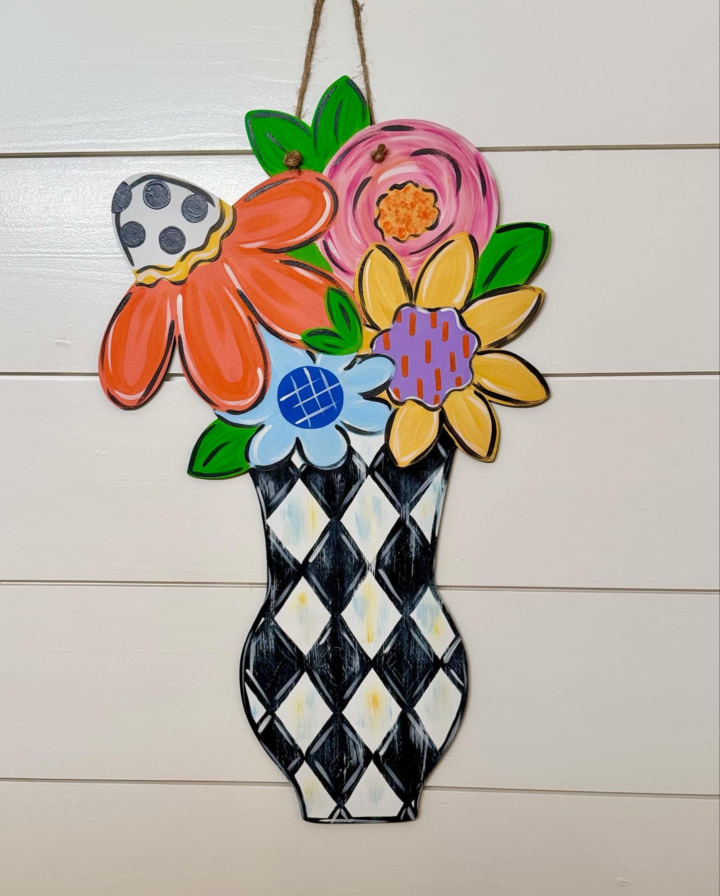 Checkered Vase of Colorful Flowers